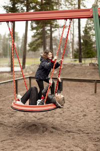 Girls on swing