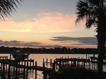 Scenic view of lake at sunset