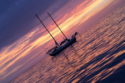 Scenic view of sea at sunset