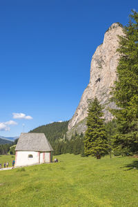 Small chapel on an alp meadow in the dolomites mountains in italy