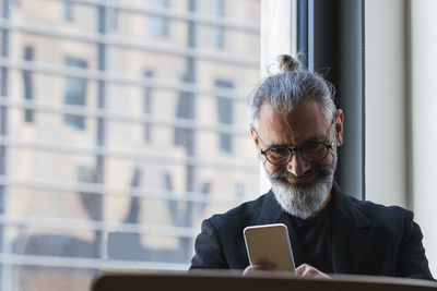 Man using smart phone