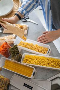 High angle view of man preparing food at market stall