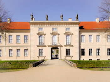 Facade of building against clear sky