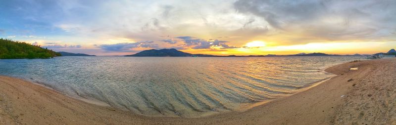 Scenic view of sea at sunset