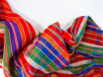 High angle view of multi colored umbrellas against white background