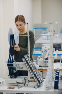 Woman working in sewing factory