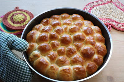 Close view of danube naples savory cake on wooden table, naples tradition, italy