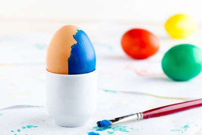 Close-up of blue eggs on table