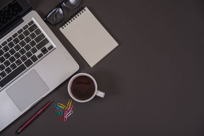 High angle view of coffee cup on table