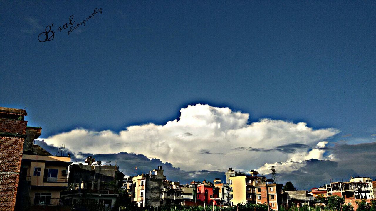 building exterior, architecture, built structure, city, residential structure, residential district, residential building, cityscape, sky, house, blue, town, crowded, high angle view, cloud - sky, townscape, day, outdoors, mountain, no people