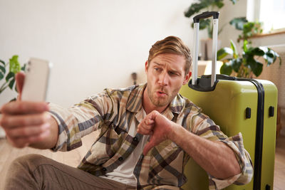 Young man using mobile phone