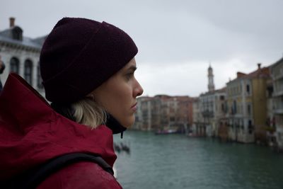 Close-up of woman looking at canal