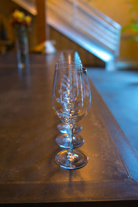 Row of empty wineglasses on table