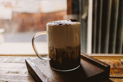 Close-up of coffee cup on table