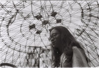 Portrait of young woman looking down