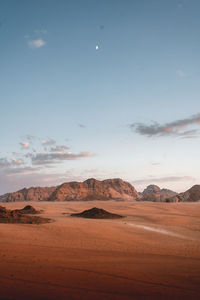 Scenic view of desert against sky