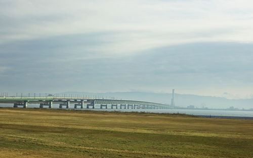 Bridge over land against sky
