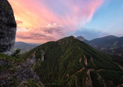 Scenic view of mountains against sky during sunset