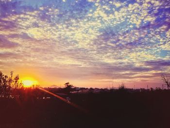 Scenic view of landscape at sunset