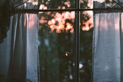 View of window against sky during sunset