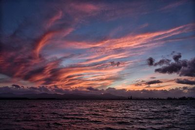 View of calm sea at sunset