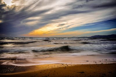 Scenic view of sea against sky during sunset