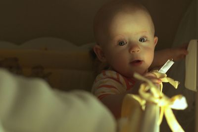 Portrait of cute girl playing at home