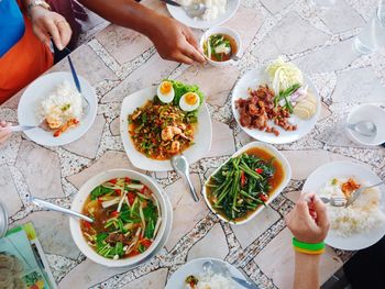 High angle view of people preparing food