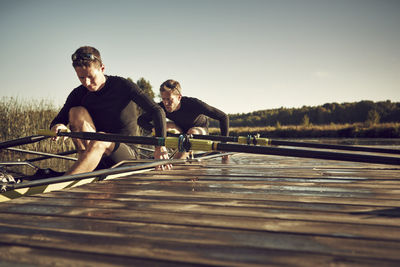 Young men at canoe