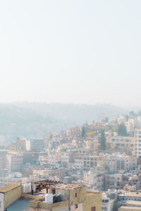 Cityscape against clear sky