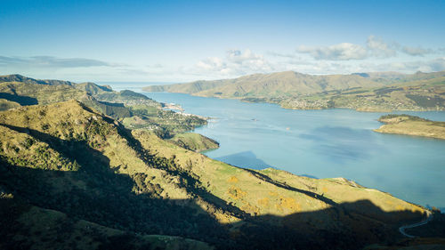 Beautiful aerial view on bay surrounded by green hills, governors bay christchurch, new zealand