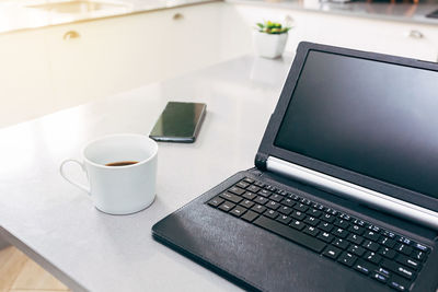 Coffee cup on table