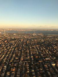 Aerial view of cityscape against sky