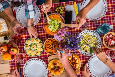 High angle view of people on table