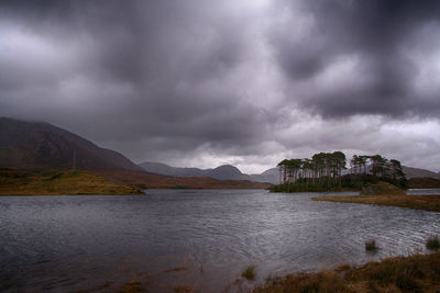 View of lake against cloudy sky