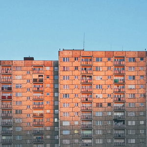 Low angle view of buildings against clear sky