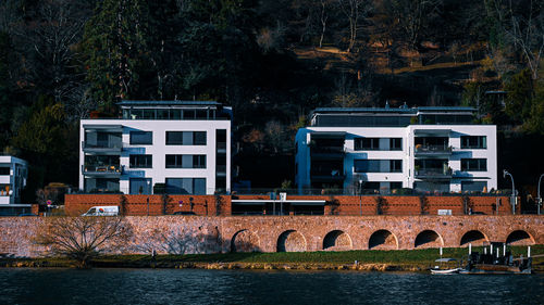 Buildings by river