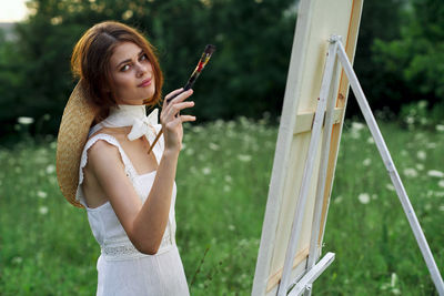 Young woman using mobile phone