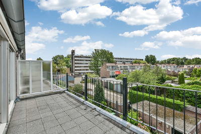 Buildings in city against sky