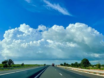 Road against cloudy sky