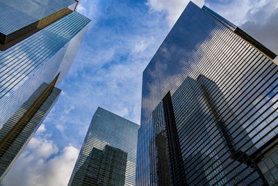 Low angle view of modern buildings against sky