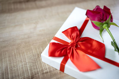 High angle view of red flower on table