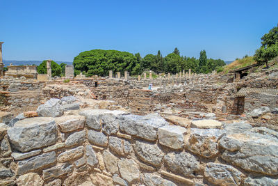 View of old ruins against clear blue sky