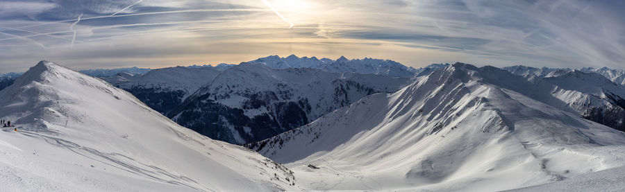 Scenic view of snowcapped mountains against sky