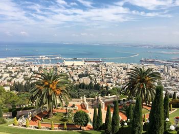 Scenic view of sea and buildings against sky