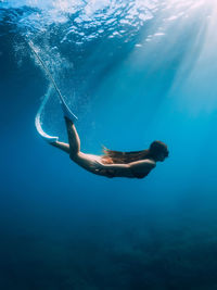 Man swimming in sea