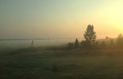 Scenic view of landscape at sunset