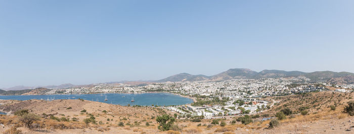 Scenic view of beach against clear sky