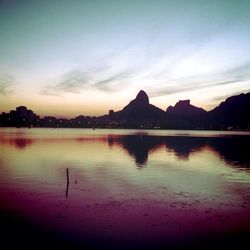 Scenic view of lake at sunset