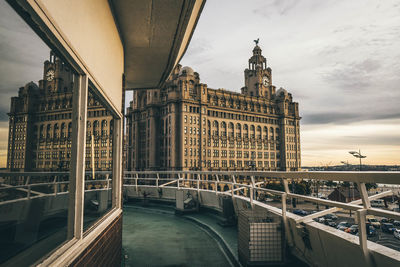 View of bridge over river in city